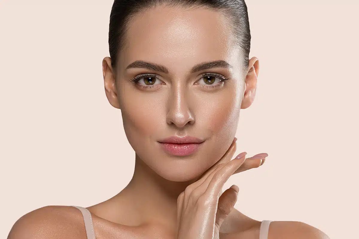 Beautiful woman face healthy skin closeup beautiful female