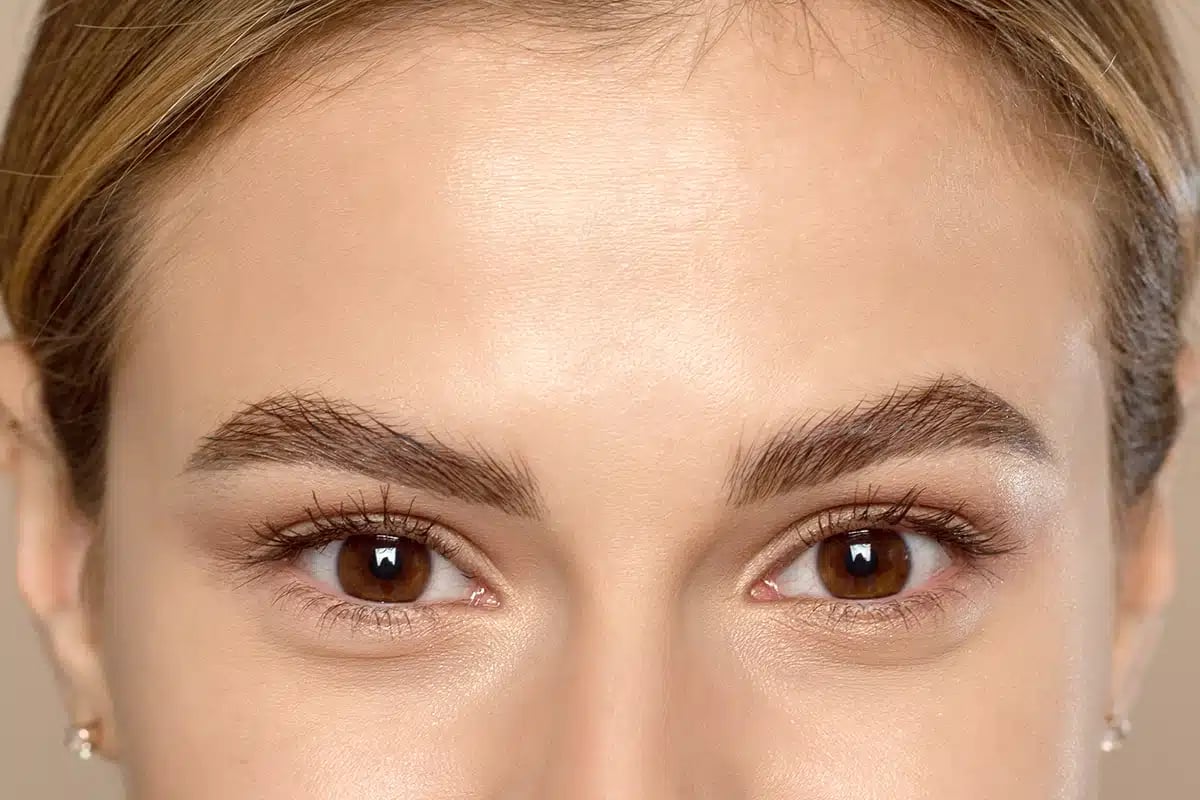 Close-up of the eyes and forehead of a lovely young woman Close-up of the eyes and forehead of a lovely young woman