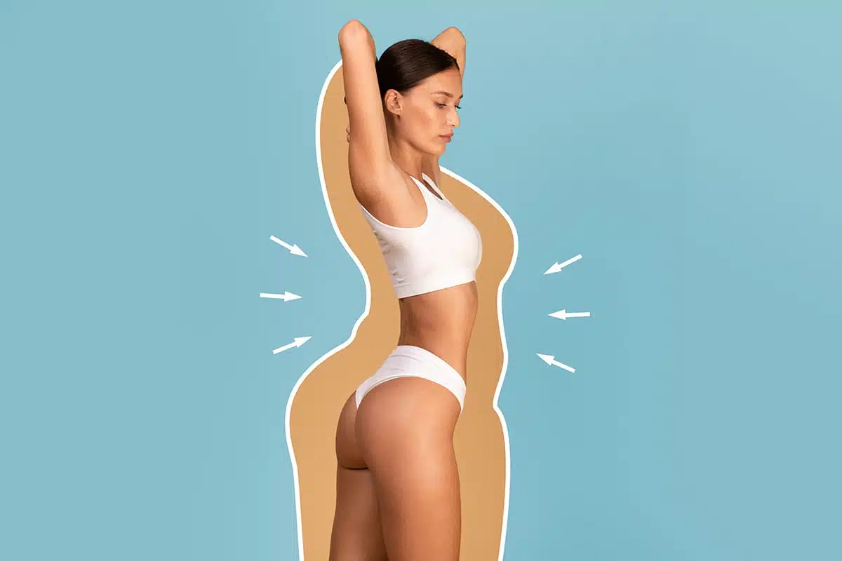 Fit lady In underwear with drawn silhouette around her body
