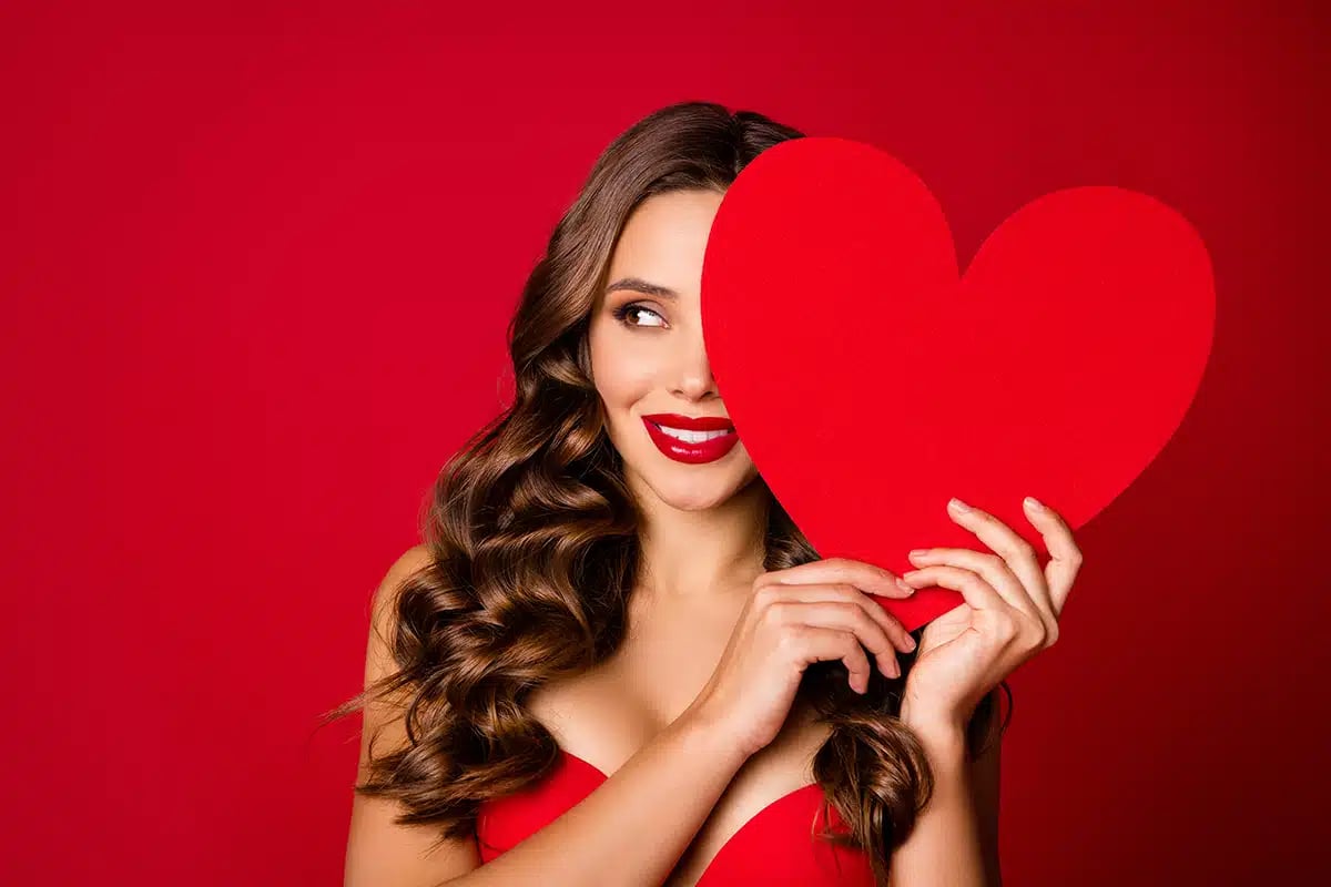 Portrait of passionate attractive flirt pretty gorgeous trend girl mistress close cover face big paper card present